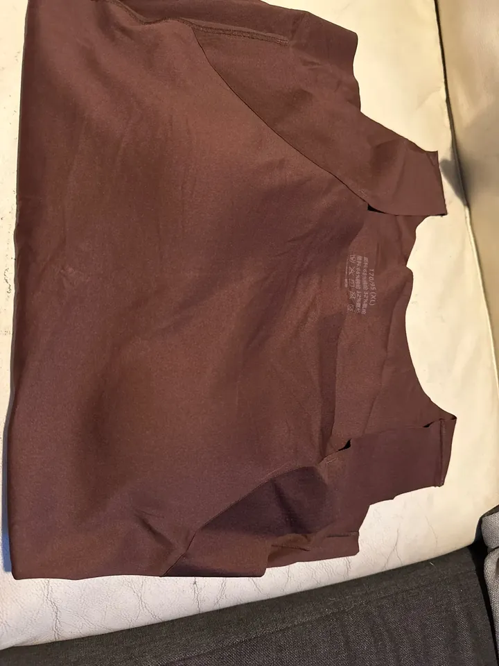 Customer review close-up of a coffee tank top