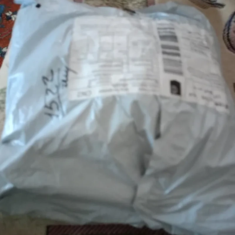 Customer review photo of a packaged tank top